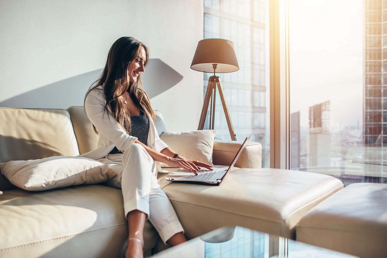 05-woman-working-from-home-laptop-scaled-1