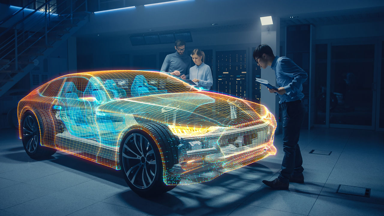 Groep van automobieldesign-ingenieurs die werken aan 3D-model in virtuele realiteit van chassis van elektrische auto