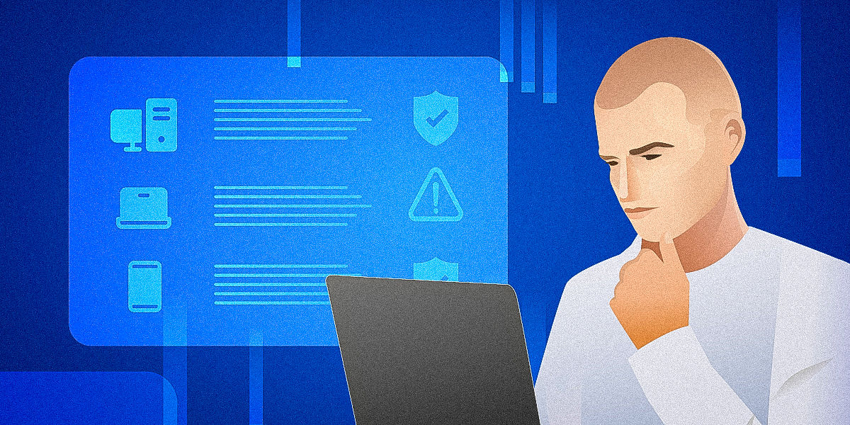 Person working on a laptop checking managed devices