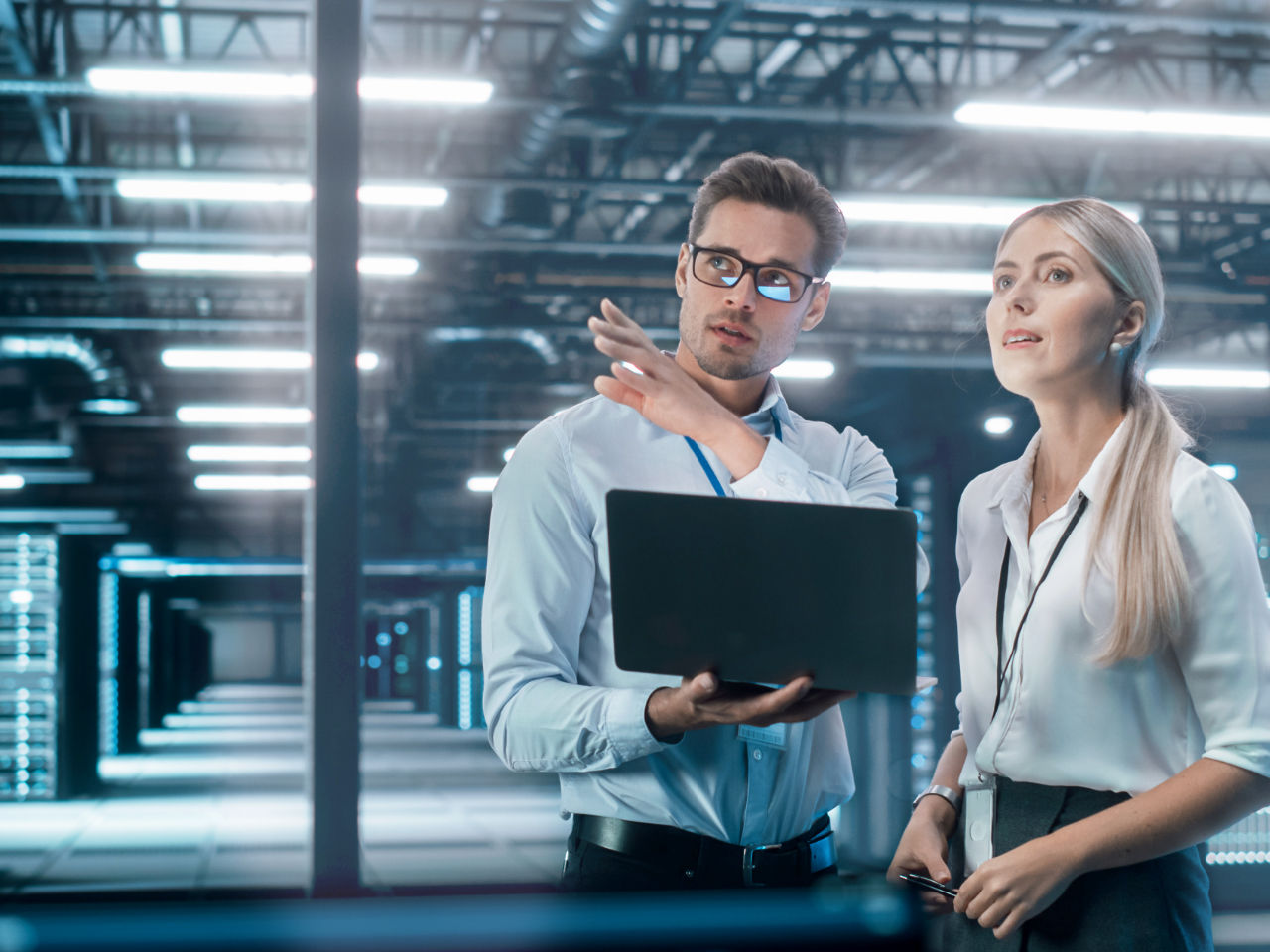 Man and woman in server facility