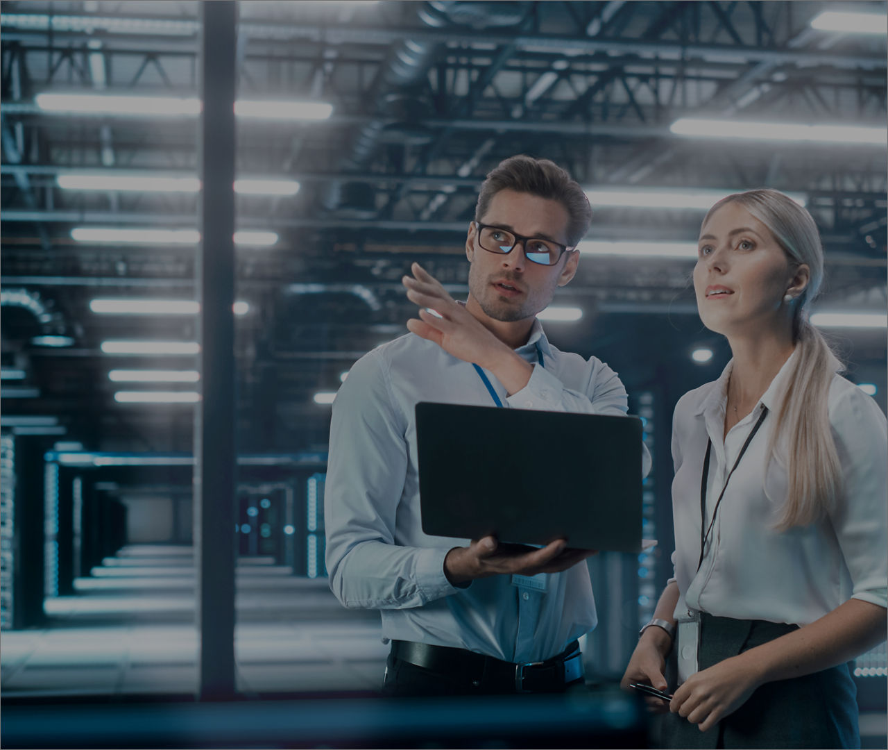 Man and woman in server facility