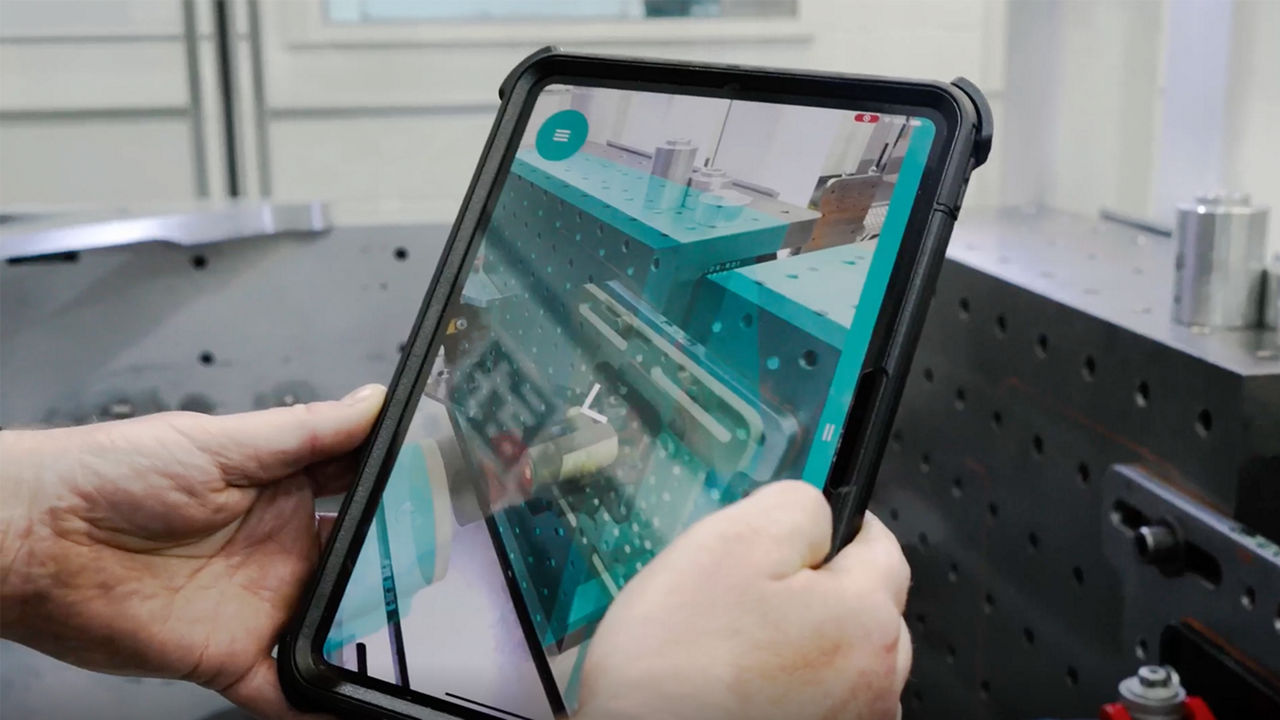 Engineer of the Mercedes-AMG PETRONAS F1 Team checking a race car