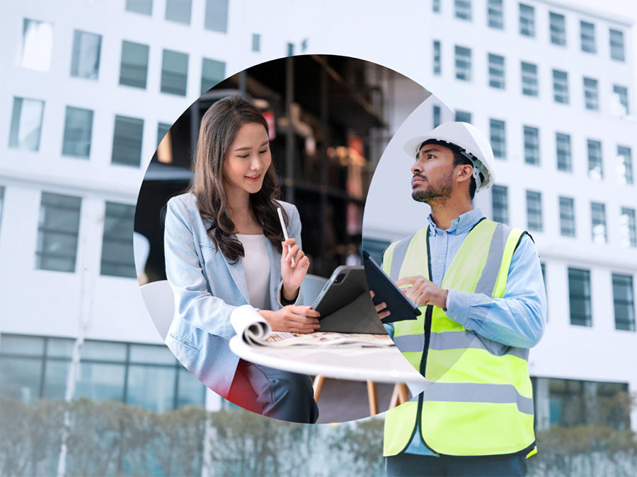 Man and woman working with tablets