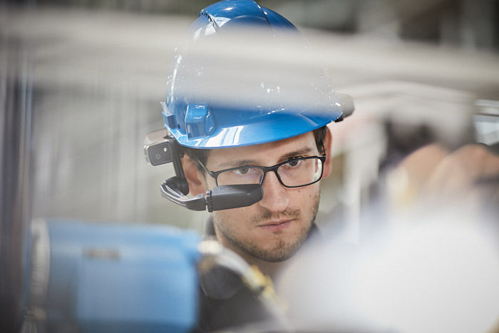 Repairman with wearable AR device