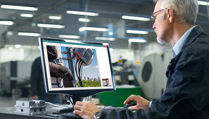 Man using Frontline’s “See-What-I-See” real-time video collaboration technology