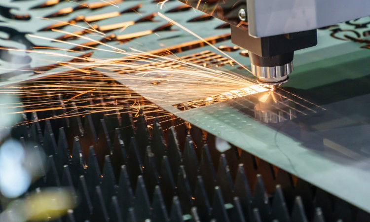 Closeup of a metal laser engraver