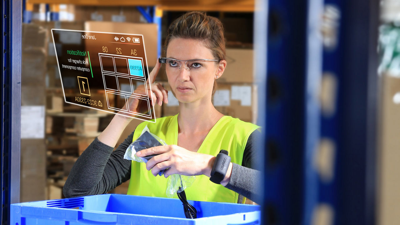 Woman with smart glasses picking orders