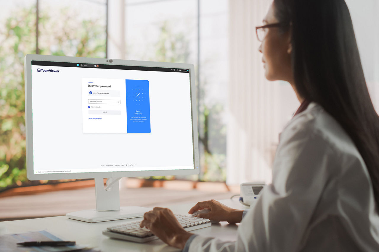 Woman logging in to TeamViewer Remote client