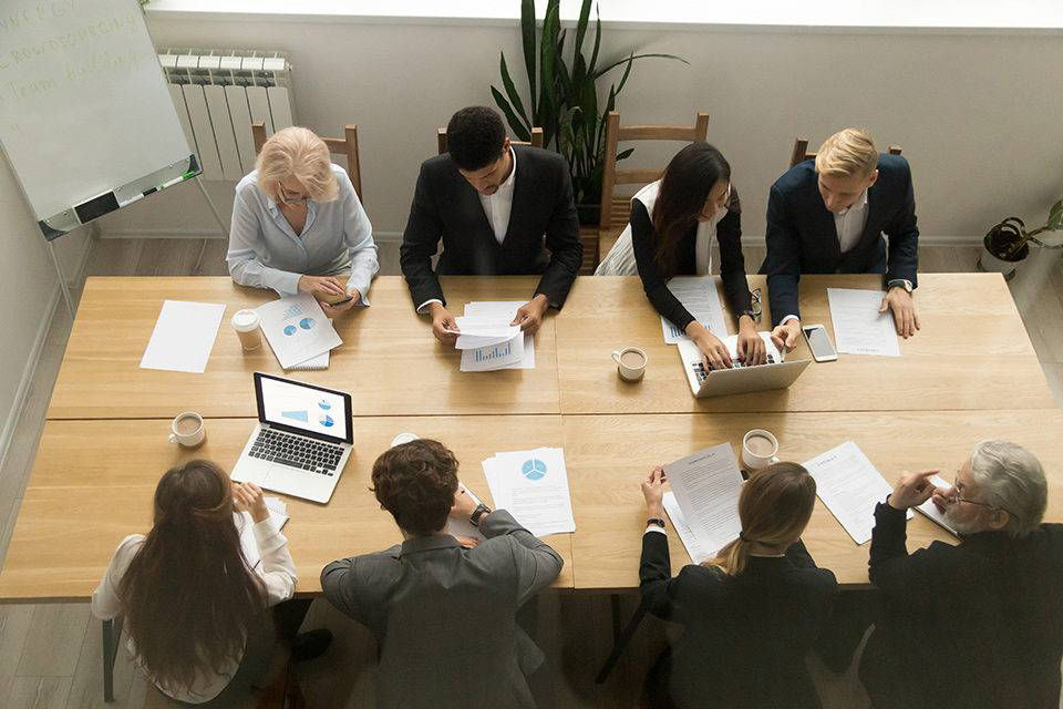 Group of employees in business meeting