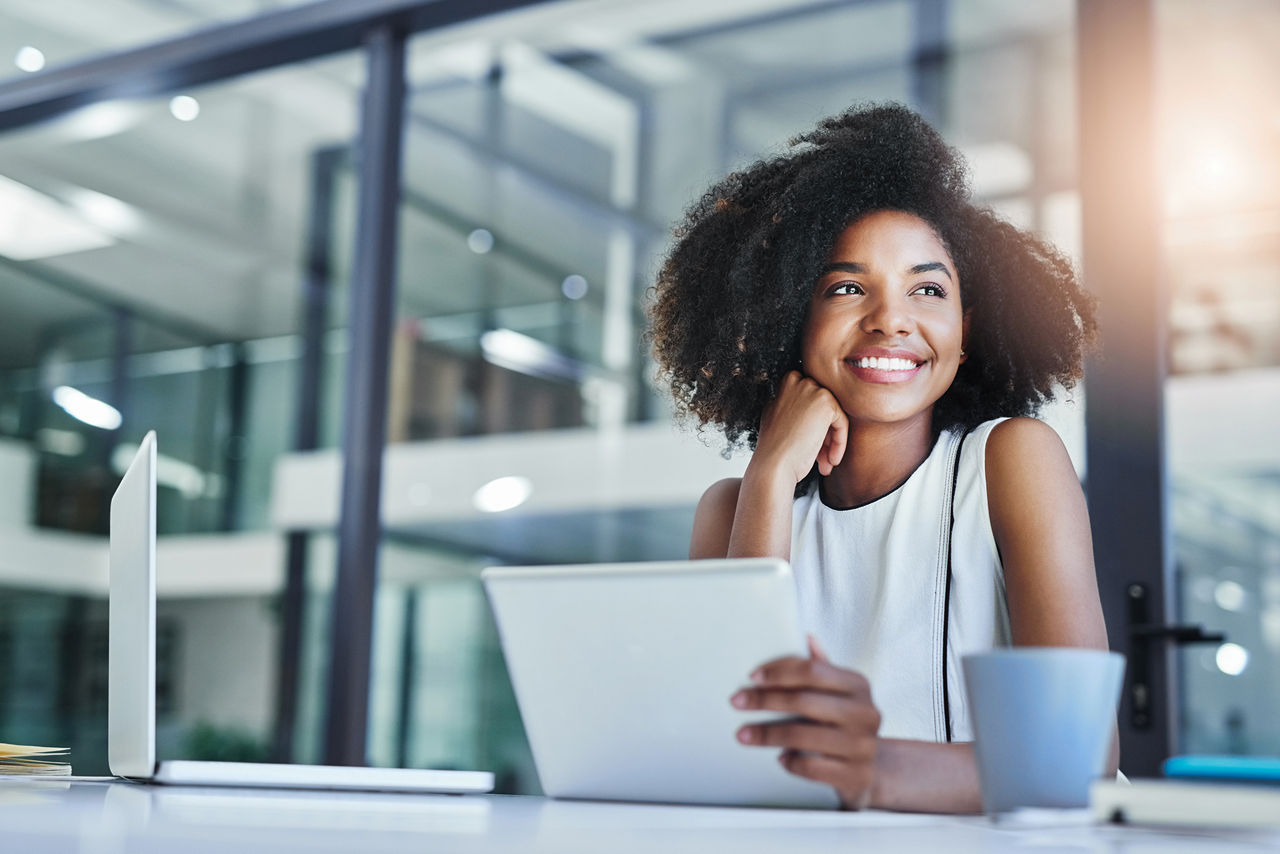 Young businesswoman working in her office