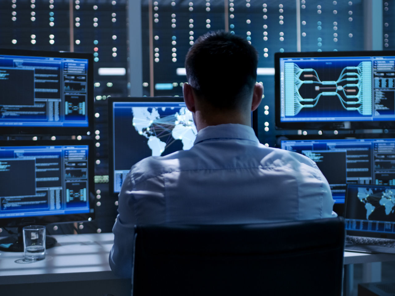 Woman working on a laptop with protected screen