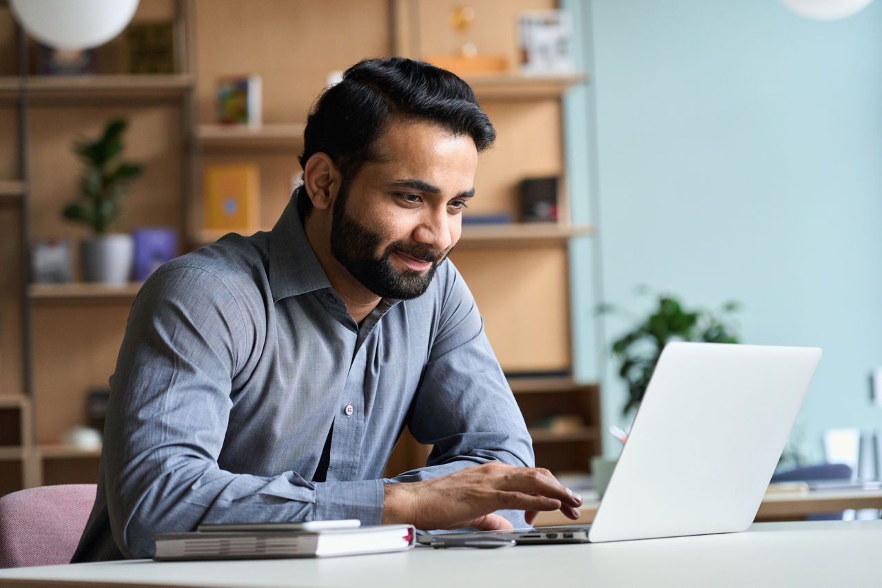 Business man working on laptop in home office