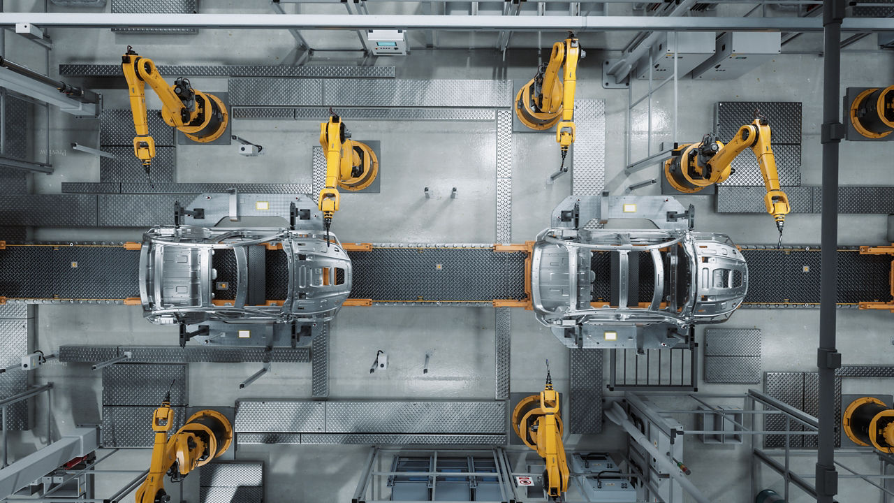 Linha de montagem automatizada com braço robótico fabricando veículos elétricos