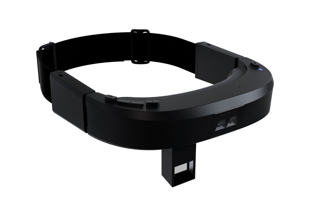 Manufacture worker fixing an issue with cables with the help of smart glasses