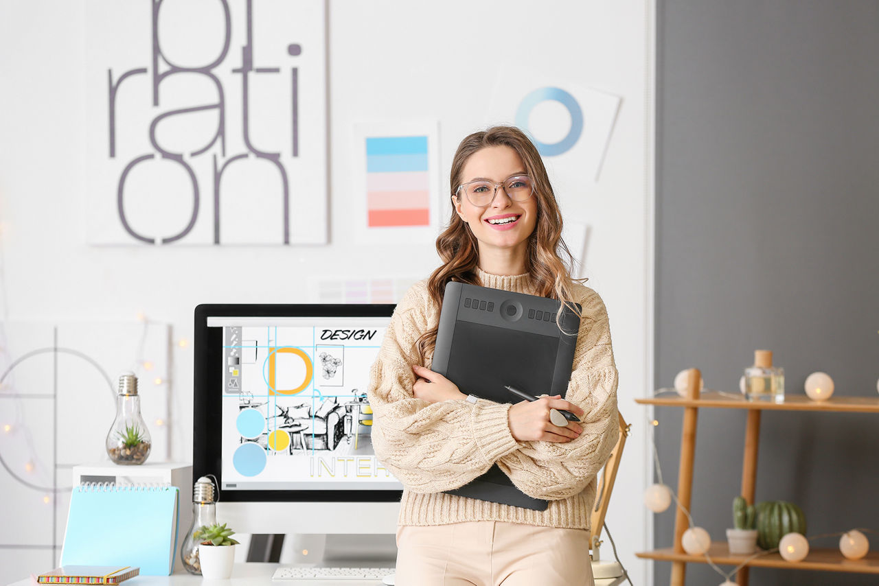 Portrait of female interior designer in office