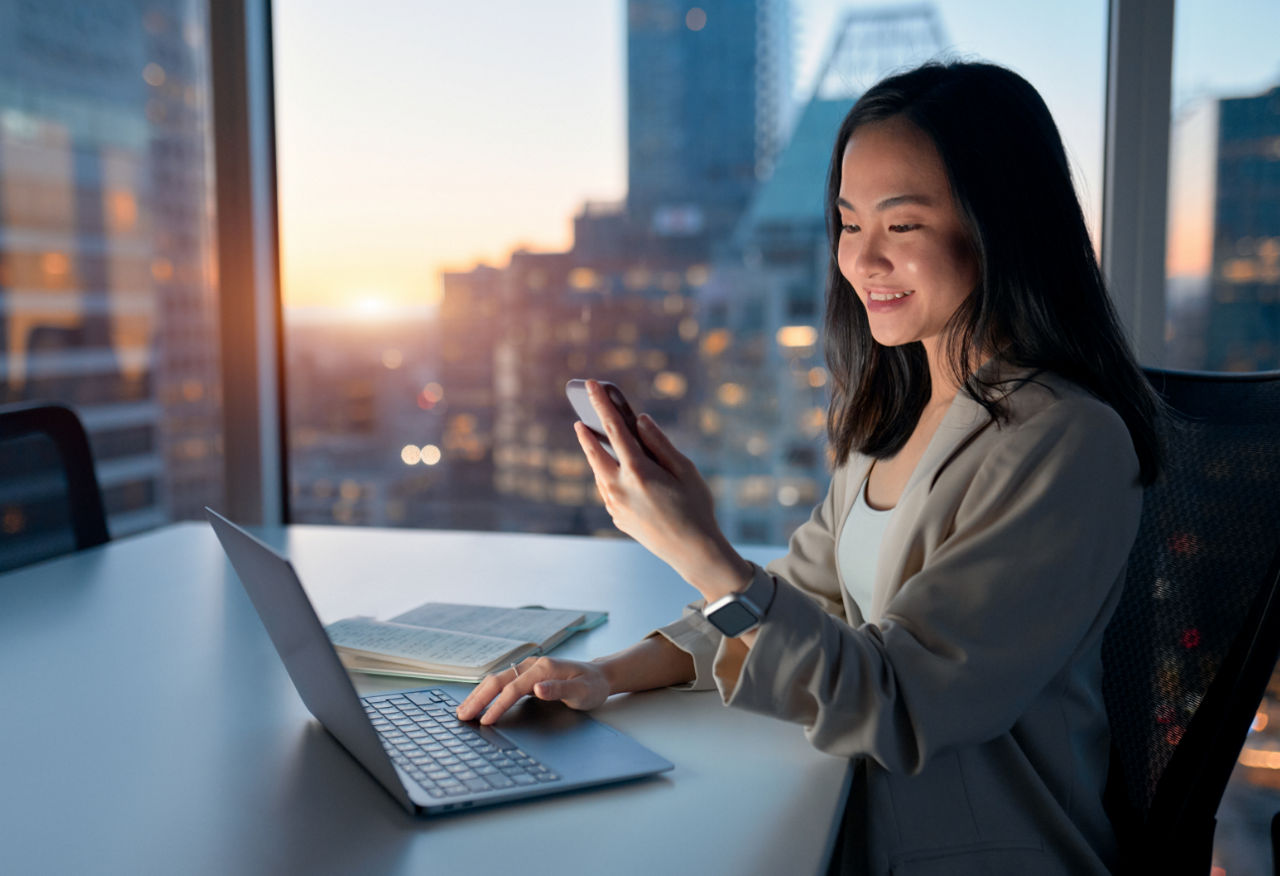 A woman transferring files from a Mac